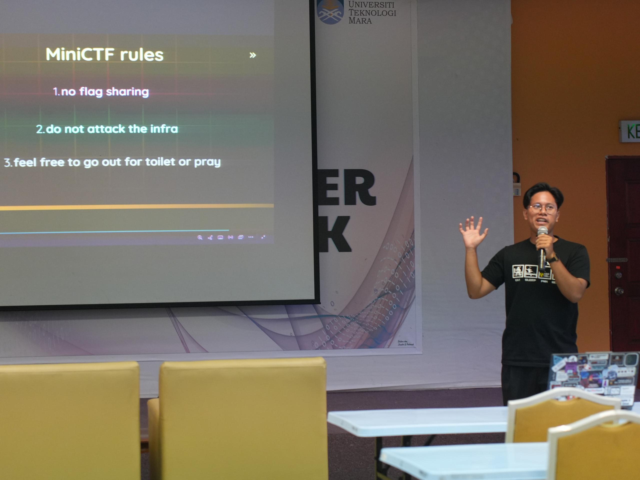 Razlan presenting during the Road to White Hat Gen 6 workshop, image 3 of 4
